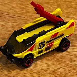 Vibrant Yellow Fire Engine Toy with Red Accents